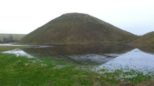 Silbury Hill surrounded by a water-filled moat