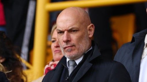 Howard Webb watches from the stands