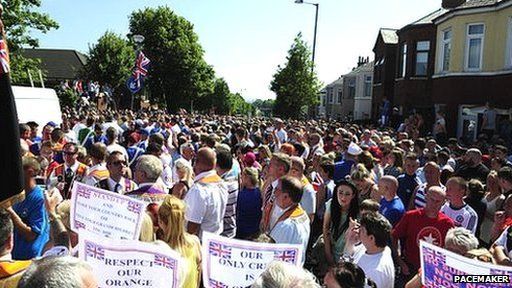 Protest as Orange parade is stopped in north Belfast - BBC News