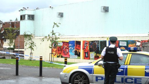 The attack happened at Woodbourne police station in west Belfast