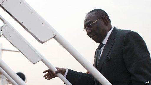 President Michel Djotodia boards a plane to fly to Chad (08.01.13)