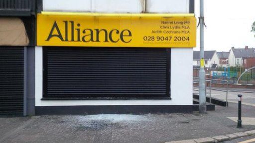 Three petrol bombs were thrown at the Alliance Party office in east Belfast at 23:00 BST on Tuesday
