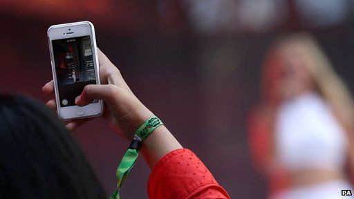 Woman holding smartphone