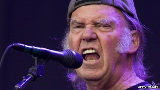 Neil Young performing at Hyde Park 2014
