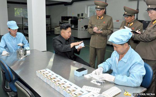 Kim Jong-un with smartphones