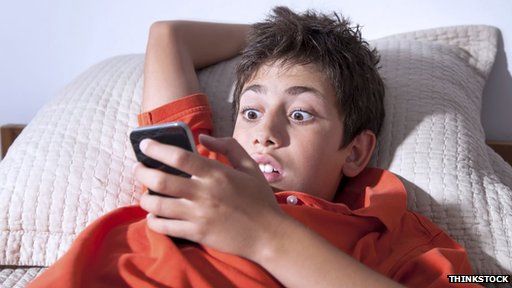 Boy using smartphone