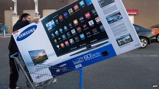 Man buying SmartTV