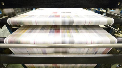 Newspapers on printing press