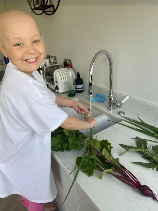 Isabella at home after losing her hair