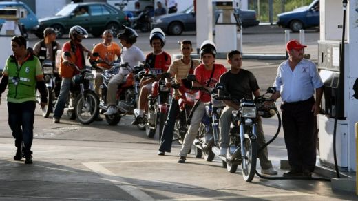 Motorbikes cueing at a petrol station in Venezuela