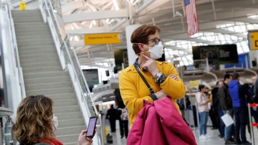 Passengers at New York's JFK airport. Photo: 13 March 2020