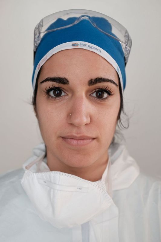 A nurse in her medical PPE