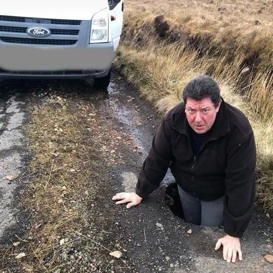Stuart Ross in pothole