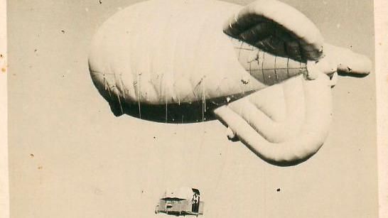 A barrage balloon with a jump cage attached to it