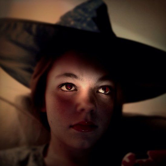Girl in witches hat