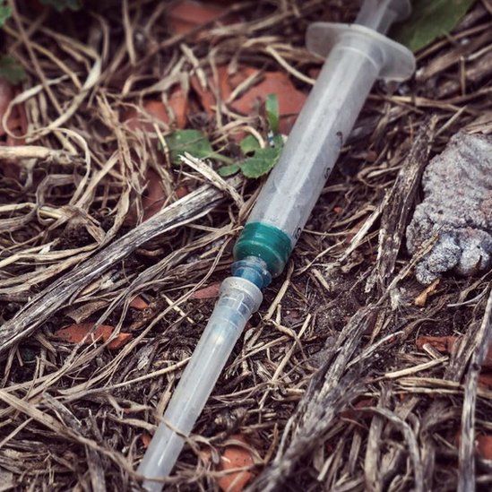 discarded syringe