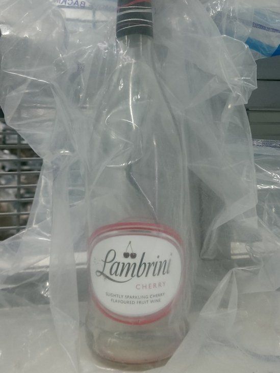The bottle in an evidence bag