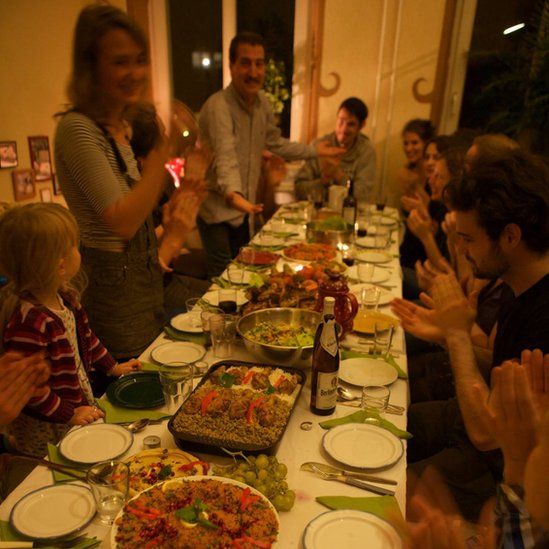 Anna Alboth and friends at her home having dinner