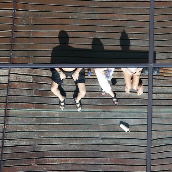 People sitting down as seen from above