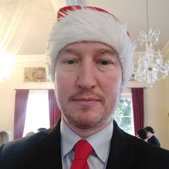 A recent image of Shaun Slator wearing a Christmas hat