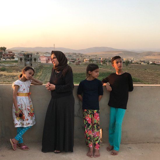 Bahar Dawood and her three children