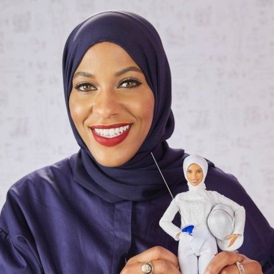 Ibtihaj Muhammad with the Barbie doll that is modelled on her