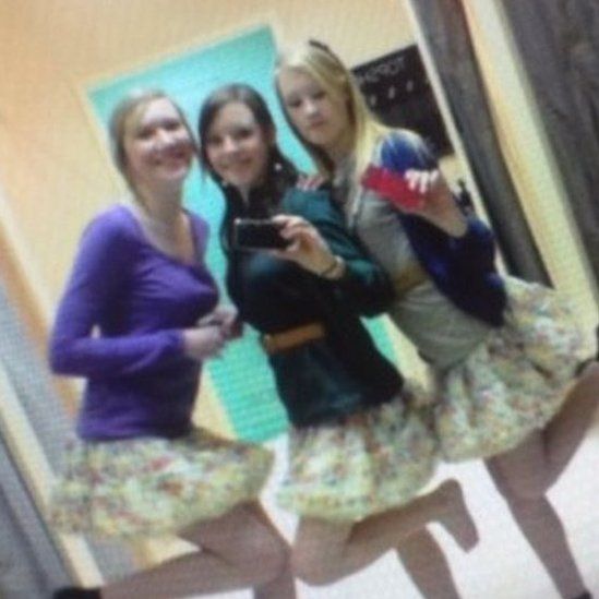 Nicole Petty with friends in changing rooms
