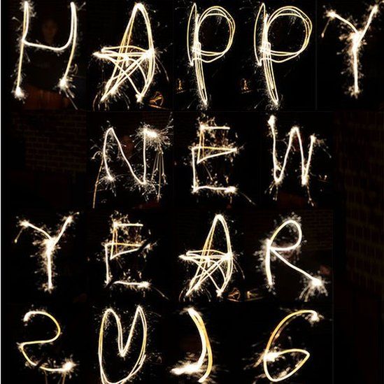 Sparklers spell out Happy New Year 2016