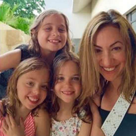 Dr. Bloom with her three daughters