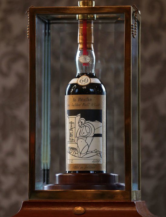 Bottle of whisky sold for world record £848,000 - BBC News