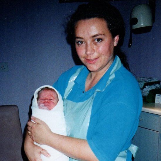 Chantelle Thornley with a baby she delivered in 2000