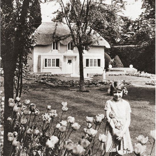 Princess Elizabeth outside Y Bwthyn Bach - her new play house