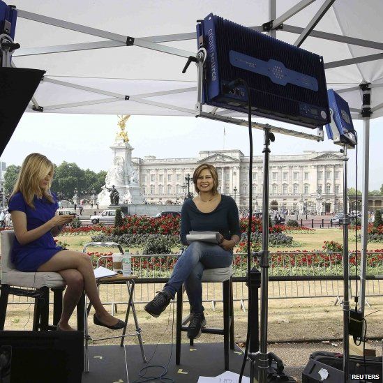 TV team outside Buckingham Palace