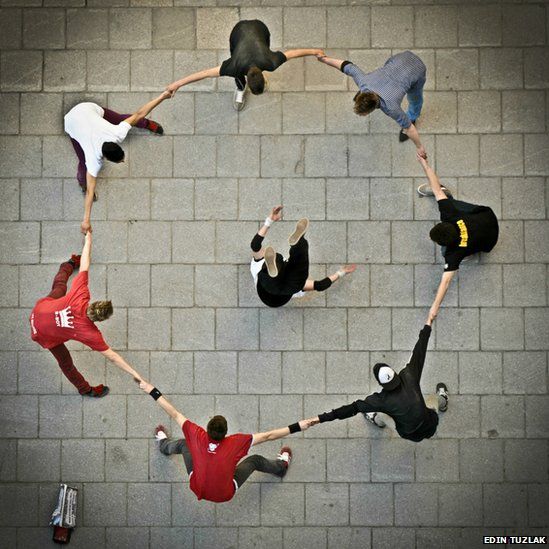 Breakdancers are seen in centre of Sarajevo