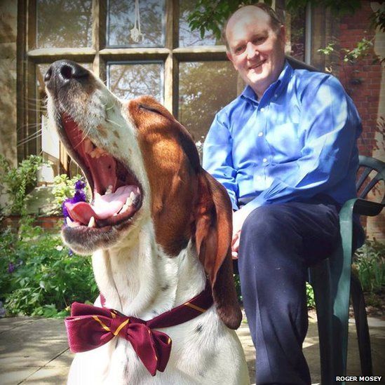 YoYo the dog and Roger Mosey, master of Selwyn College