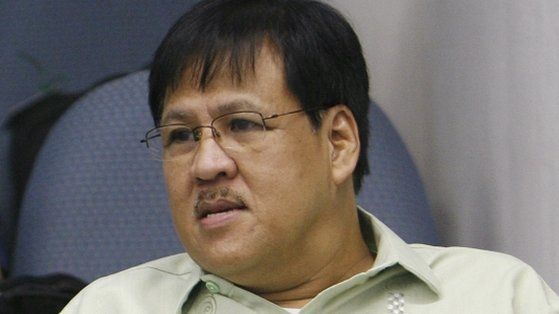 Philippines Interior Minister Jesse Robredo attends an inquiry at Senate headquarters in Manila in this September 30, 2010 file photo