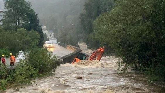 Digger in river