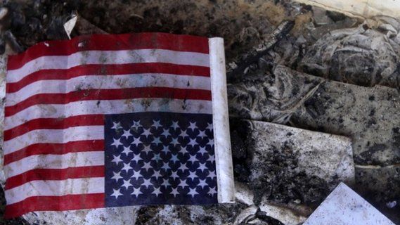 An American flag in the rubble at the US consulate in Benghazi, Libya