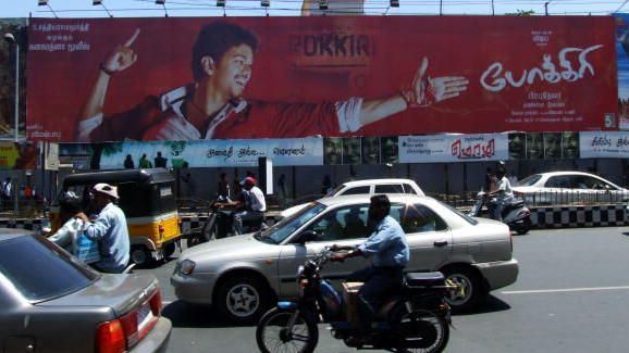 Pokkiri Tamil movie poster and traffic on road in Chennai in 2007