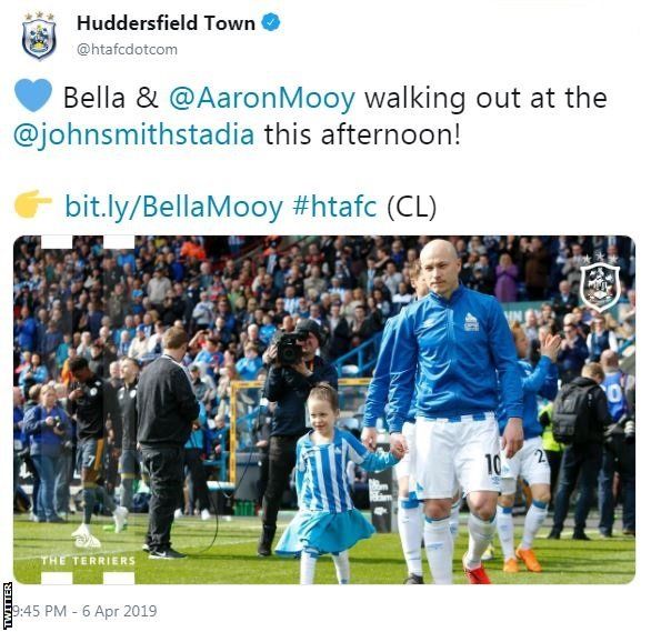 Huddersfield Town tweet: "Bella and Aaron Mooy walking out at the John Smith's Stadium this afternoon!"
