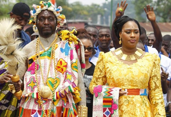 People colourfully dressed at a festival