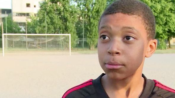 Kylian Mbappe as a child on a training pitch