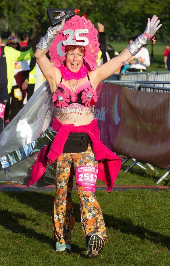 London, UK. 16th May 2015. Participants with illuminated bras at the Walk  the Walk, Moonwalk charity marathon 2015, London, England, raising funds to  help beat breast cancer by walking a marathon around