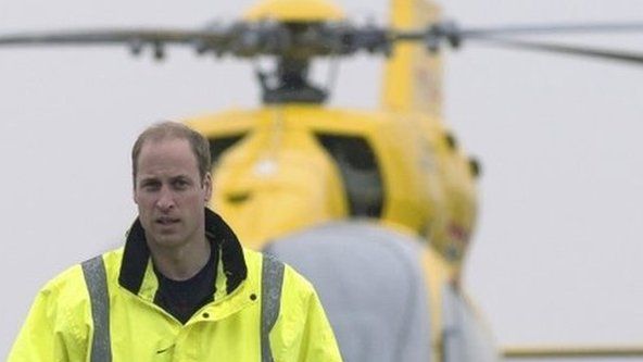 Prince William walks away from his helicopter