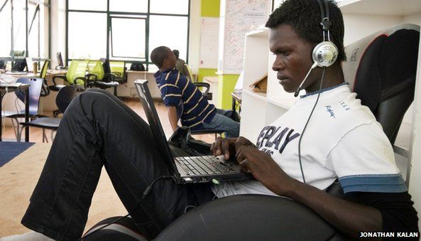 A man uses a laptop at iHub in Kenya