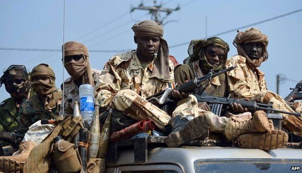 Chadian troops of the African-led International Support Mission to the Central African Republic (MISCA) patrol Bangui following the resignation of the president