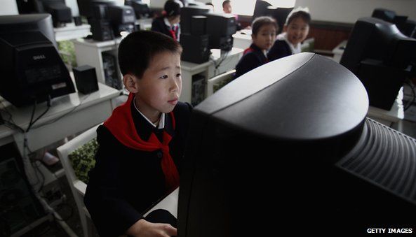 Primary school children using PC