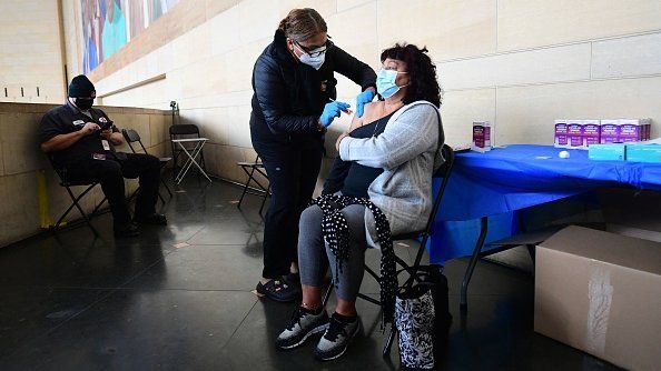 A woman receiving a Covid-19 vaccine in Los Angeles earlier in January.