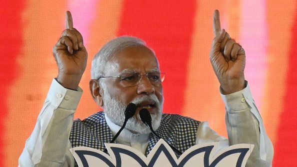 rime Minister Narendra Modi gestures as he addresses a Bharatiya Janata Party (BJP) campaign meeting ahead of the Telangana state elections at Lal Bahadur Stadium in Hyderabad on November 7, 2023.