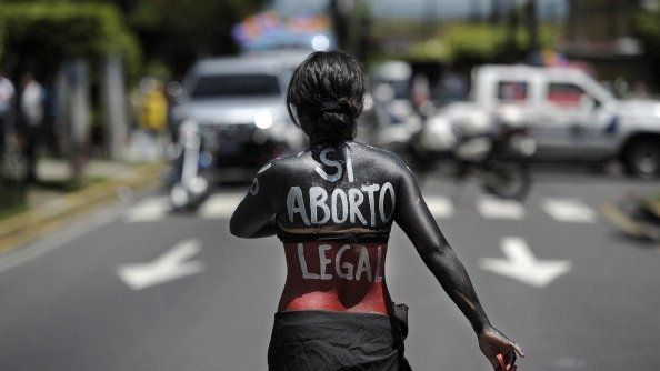 A woman participates in a march on the International Day of Action for the Decriminalization of Abortion, on September 28, 2012 in San Salvador